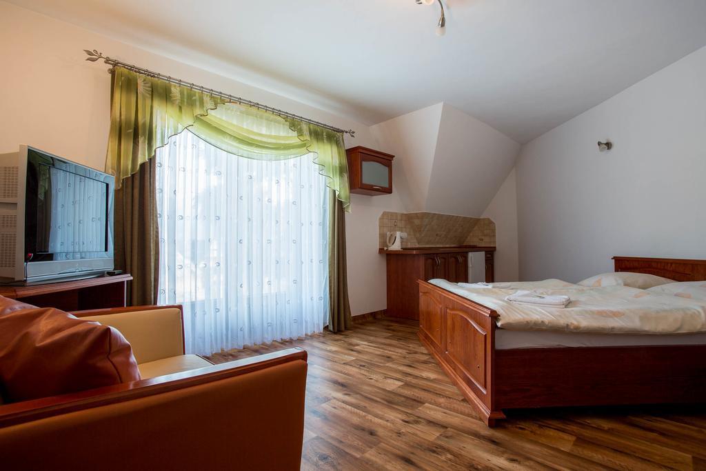 Sykowny Dworek Apartamenty Kościelisko Rum bild